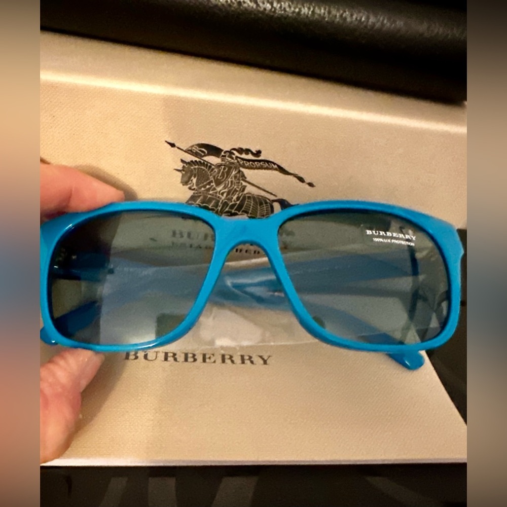 Burberry Blue sunglasses. New in box with case,cloth and booklet.